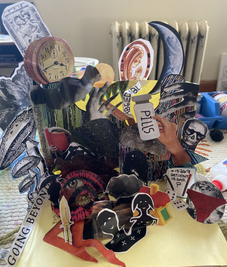 This collage is constructed in a three-dimensional “pop-up” style. The background is brightly coloured stripes, and the bottom of the display is a soft yellow. The images are arranged roughly in three sections. The first section, to the left, starts with the text “going beyond”. Following this up is three mushrooms, a mountainside, a card showing spiritual iconography that reads “be my guide” and a clock. The second section, toward the middle, includes a sharp knife set over two legs, two friendly looking figures that are joined together, a play house, different colours and patterns and landscape imagery, a person with their head in a book, and a hand reaching up. The final section, shows dice, a notebook with the words “#15267 Patient is Sad ?” written on it; a hand holding a bottle labelled “pills”, a skull wearing glasses, text that reads “Labelled Abled”, a crescent moon, a gemstone with underwear pasted on top, and another hand reaching down. 